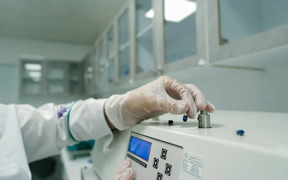 Engineer working on medical equipment in a lab